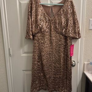 Rose gold sequin size 22 dress. Never worn. Tag still attached.